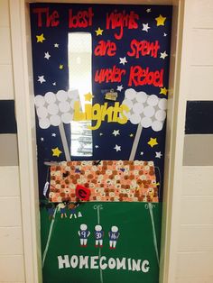 a door decorated to look like a football field with the words'the best nights are spent under red lights '