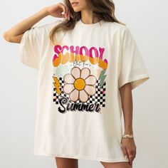 Groovy School Out For Summer Shirt, Custom Teacher Student Shirt, Last Day Of School Tee, Summer Vibes, Beach Vibes Shirt  The Standard T-Shirt, personalized to suit your individual style, serves as the perfect medium for self-expression. Made from 100% preshrunk cotton, this timeless short-sleeve tee not only ensures comfort but also offers ample opportunities for print-on-demand customization. Whether you seek to showcase your creativity, promote your brand, or commemorate a special occasion, Retro Summer T-shirt For Day Out, Trendy Floral Print T-shirt For Day Out, Relaxed Fit Tops For School In Spring, Short Sleeve T-shirt For School In Summer, Cute Multicolor T-shirt For Vacation, Multicolor Tops With Text Print For Summer, Multicolor Text Print Tops For Summer, Summer Shirt With Graphic Print For Day Out, White T-shirt For School In Spring