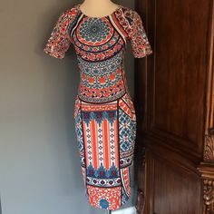 Chase The Winter Blues Away With This Comfortable And Easy To Pack Flattering Stretch Dress From One Of India’s Hottest Designers. Length 41.5" Waist 14" Hip 15" Bust 16" Winter Blues, Stretch Dress, The Winter, Blue Orange, Colorful Dresses, Midi Dress, Like New, India, Womens Dresses