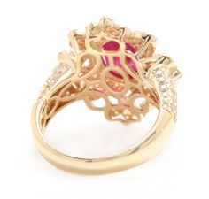 4.50 Carats Impressive Red Ruby and Natural Diamond 14K Solid Yellow Gold Ring Suggested Replacement Value $6,000.00 Total Red Ruby Weight is: Approx. 3.00 Carats (Treated: Lead Glass Filling) Ruby Measures: Approx. 9.00 x 7.00mm Natural Round Diamonds Weight: Approx. 1.50 Carats (color H-I / Clarity SI1-SI3) Ring total weight: 7.3 grams Disclaimer: all weights, measurements and colors are approximate and may vary slightly from the listed dimensions or as seen in the image. All pictures are magn Luxury Yellow Gold Ruby Ring With Center Stone, Luxury 14k Gold Ruby Ring, Luxury Red Diamond Ring With Polished Finish, Luxury Ruby Ring For Anniversary, Luxury Red Cluster Ring With Center Stone, Luxury Ruby Ring With Halo Setting For Formal Occasions, Luxury Ruby Cluster Ring For Formal Occasions, Luxury 14k Gold Ruby Ring With Brilliant Cut, Luxury 14k Gold Ruby Ring For Formal Occasions