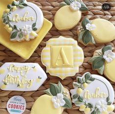 decorated cookies in the shape of lemons and flowers