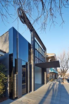 a modern building with large windows on the outside