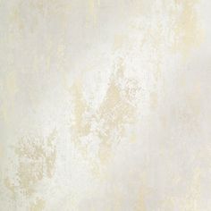 a white and yellow wall with some stains on it