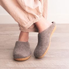 Experience Unparalleled Comfort with Our Handcrafted Wool SlippersWrap your feet in the warmth and luxury of our meticulously crafted wool slippers, designed with your comfort and sustainability in mind. Made from 100% organic merino wool, these slippers offer a cozy embrace for tired feet, making them perfect for relaxing at home.Why Our Wool Slippers Stand Out:Sustainable Luxury: Sourced from ethically-raised merino sheep, our wool is not only soft and warm but also eco-friendly. Embrace susta Comfortable Winter Clogs With Leather Sole, Wool Slippers With Cushioned Footbed And Round Toe, Comfortable Wool Closed Toe Clogs, Comfortable Brown Wool Slippers, Casual Wool Slippers With Leather Sole, Casual Wool Slippers For Winter, Indoor Wool Slippers With Rubber Sole, Wool Slippers With Leather Sole For Winter, Winter Wool Slippers With Cushioned Footbed