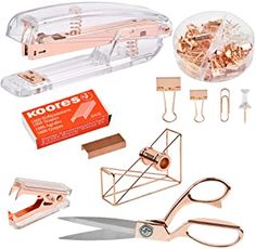 various crafting supplies including scissors, wire cutters and paper clips on a white background