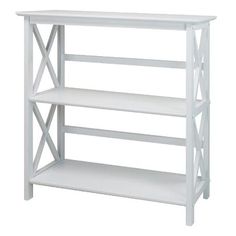 a white shelf with three shelves on each side