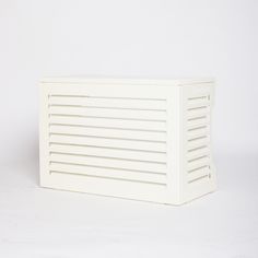 a white plastic box sitting on top of a table