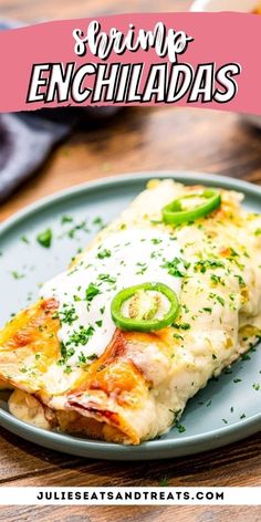 an enchiladas on a blue plate with green peppers