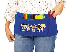 a woman holding a blue belt with cartoon stickers on the front and back pockets