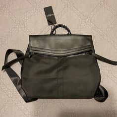 Botkier Backpack, All Black With Inside Pocket Never Used, Open To Offers Two Zipper Pockets In The Front Daily Use Flap Bag With Zipper Closure, Black Flap Backpack For Everyday Use, Everyday Black Flap Backpack, Everyday Flap Bags With Zipper Closure, On-the-go Flap Bags With Zipper Closure, Black Flap School Bag, Modern Flap Bag With Zipper Closure, Mini Backpack Purse, Small Backpack