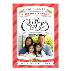 a merry little christmas card with an image of two adults and a child on it