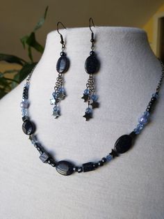 "A beautiful midnight themed necklace and earring set! This set is great for any night occasion and would make a wonderful gift! The necklace is approximately 18\" long and can be adjusted about 0.5\" longer or shorter by clasping it at different locations on the chain. (earrings are pre disinfected)" Midnights Jewelry, Jewelry Set Design, Purple Necklace, Jewelry Accessories Ideas, Dope Jewelry, Handmade Jewelry Diy, Necklace And Earring Set, Black Jewelry, Blue Jewelry