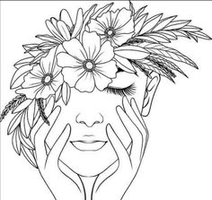 a woman's face with flowers on her head and hands over her face, while she