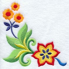 a close up of a towel with flowers on it