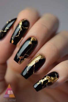 Golden Glam! These black acrylic nails with intricate gold accents offer a luxurious and elegant design. Perfect for making a statement at any event. Visit nailhow.com for more glamorous nail designs. Save this pin for your next nail appointment! Black Nails Inspo Elegant, Nail Black And Gold, Nail Art Designs Gold Glitter, Black And Golden Nails Design, Black And Golden Nail Art, Golden Acrylic Nails, Nail Black Gold