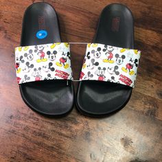 Mickey Mouse Slippers Sz Various Casual Synthetic Closed Toe Slides, Casual Round Toe Synthetic Flip Flops, Casual Synthetic Flat Flip Flops, Casual Synthetic Slides With Flat Heel, Casual Black Flat Heel Flip Flops, Black Slip-on Flip Flops, Black Slip-on Casual Flip Flops, Black Casual Slip-on Flip Flops, Black Casual Slippers With Cushioned Footbed