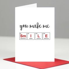 a card with the words you make me smile on it, and an element in the middle