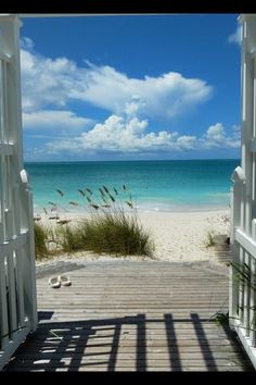 an open door leading to the beach