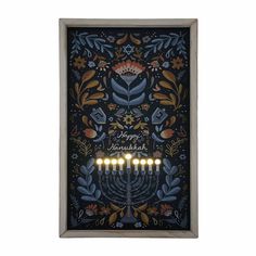 a hanukkah menorah with five candles lit up in the middle