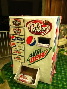 an image of a machine that is made out of soda cans and paper machines