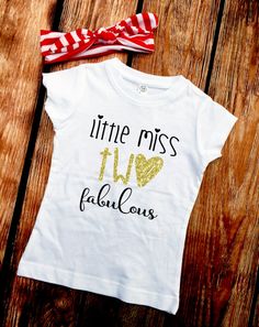 a little miss t - shirt with gold glitter hearts on it and a red striped headband