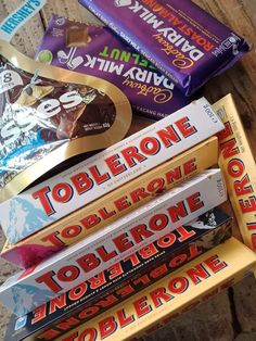 chocolate bars stacked on top of each other with the words toblerone written on them