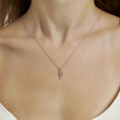 The symbolic Wing Charm Necklace is the ideal present for a loved one or for yourself. You will be charmed by this necklace and it will be a wonderful addition to your collection of designer accessories. Metal: 925 sterling silver Coating: 18k gold Pendant: 3.2 x 1.0 cm (1.25" x 0.4") Stones: cubic zirconia Chain style: cable link Chain length: 40 cm + 5 cm extender (16" + 2") Hypoallergenic: nickel-free materials used therefore suitable for those with metal allergies Designer Accessories, Silver Gifts, Gift For Friend, Necklace Sterling Silver, Chain Ring, Chain Earrings, Gold Pearl, 925 Sterling Silver Jewelry, Chain Styles