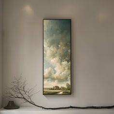 a painting hanging on the wall above a shelf