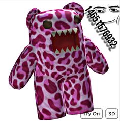 a pink and white stuffed animal with big teeth