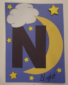 the letter n is for night and stars are on the moon with clouds above it