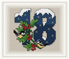 the number is decorated with holly and berries