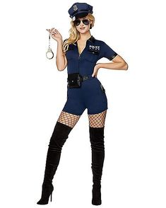 a woman dressed as a police officer holding a key