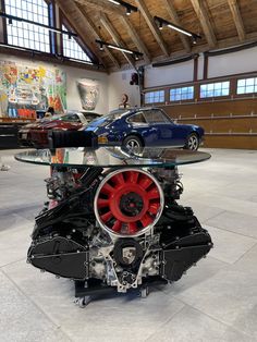 a car engine sitting on top of a glass table