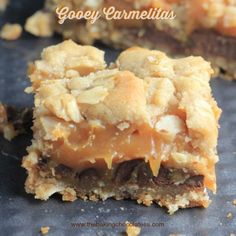 gooey caramelia bars are stacked on top of each other and ready to be eaten