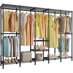 an iron rack with clothes and handbags on it