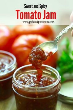 a spoon full of tomato jam with tomatoes in the background and text overlay reading sweet and spicy tomato jam