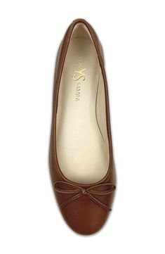 Signature logo hardware and a delicate vamp bow lend luxe elements to a timeless ballet flat set on a cushioned footbed for lasting comfort. Memory foam cushioning with arch support Slip-resistant sole Leather upper and lining/rubber sole Imported Elegant Cushioned Closed Toe Ballet Flats, Elegant Closed Toe Ballet Flats With Cushioned Footbed, Elegant Ballet Flats With Cushioned Footbed, Elegant Ballet Flats With Cushioned Footbed And Low Heel, Elegant Low Heel Ballet Flats With Cushioned Footbed, Elegant Almond Toe Ballet Flats With Cushioned Footbed, Elegant Formal Flats With Arch Support, Elegant Flats With Arch Support And Round Toe, Elegant Closed Toe Flats With Arch Support