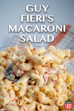 a spoon full of macaroni salad with the words guy fieri's macaroni salad