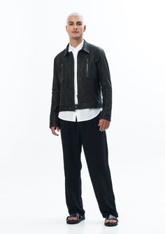 A sleek update to our all-time bestselling leather jackets, the Sergeant Jacket is crafted from supple sheepskin with nickel hardware and a slim, slightly cropped fit. — Center zipper closure— Zipper pockets on torso — Nickel zipper, belt buckles, and snap details on body— 100% sheep leatherSIZE + FIT— Slightly cropped fitted jacket — Long fitted sleeves— Fits true to size; if between sizes, size up — Model is 6’0 and wearing a size MCARE— Specialty leather clean