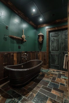 a large bath tub sitting inside of a bathroom next to a wooden door on the wall