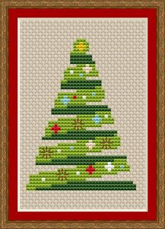 a cross stitch christmas tree with presents on it