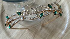 Add a touch of elegance to your outfit with this stunning headband tiara. The green and gold sparkling crystal makes the perfect accessory for a formal occasion.  The headband style makes it comfortable  to wear all day long. Make your special day memorable with this gorgeous tiara.  One size fits all. Flower Girl Hair Accessories, Flower Girl Hair, Bridesmaid Flower, Princess Tiara, Flower Girl Hairstyles, Wedding Hair Inspiration, Headband Tiara, Crystal Headband, Crystal Tiaras