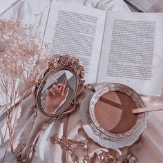 an open book sitting on top of a table