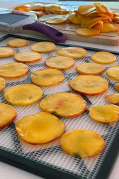 there are many pieces of food on the baking sheet and one is ready to be cooked