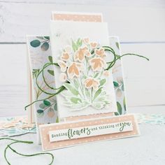 a close up of a card with flowers on it