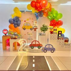 a birthday party with balloons and decorations