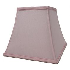 a pink lamp shade on a white background