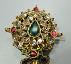 A beautiful rare find antique turban pin from the house of Maharaja of Rajasthan, encrusted with old mine cut Diamonds, Rubies, Emeralds set in 20 carats solid Gold and back adorned with multicolor enamel exquisite work, Detailed Kundan Meen work an Original classic collectors piece which could be easily adopted into two individual pendants or Brooch and a pendant. a very versatile piece in good condition. Size of piece-9.5/5.5 cm, total weight-45.6 grams(1.60 ounces). Material-solid 20 carat go Traditional Yellow Gold Pendant Brooches, Traditional Yellow Gold Brooches As Gifts, Traditional Ceremonial Brooch Jewelry, Traditional Brooch With Intricate Design As Gift, Traditional Brooches With Intricate Design As Gift, Traditional Brooches With Intricate Design For Gifts, Mughal Jewelry, 22k Gold Bangles, Sterling Silver Bangle Bracelets