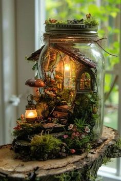 a glass jar filled with plants and lights