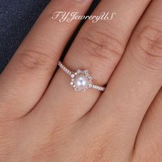 Pearl engagement ring Rose gold Pink Akoya Pearl Ring Women Natural diamond halo wedding ring June birthstone Half eternity cluster vintage ✨ This listing sells the main ring only - other jewelry pieces shown in the pictures are for reference only. Click it to get the bridal set: https://www.etsy.com/listing/1033341113 https://www.etsy.com/listing/1030291721 Items Description: Engagement Ring: * Center stone: Natural Akoya Pearl, 5MM, Round Cut * Accents: Natural Diamonds, VS clarity, G color, 0 Wedding Halo Ring In Diamond White, Wedding Cluster Ring With Halo In Diamond White, Wedding Diamond White Cluster Ring With Halo, Diamond White Halo Design Ring For Proposal, White Cubic Zirconia Halo Ring For Wedding, Proposal Cluster Ring In White Cubic Zirconia, Proposal Cluster Ring With White Cubic Zirconia, White Cubic Zirconia Cluster Ring For Proposal, Rose Gold Diamond Ring With Halo Setting For Wedding